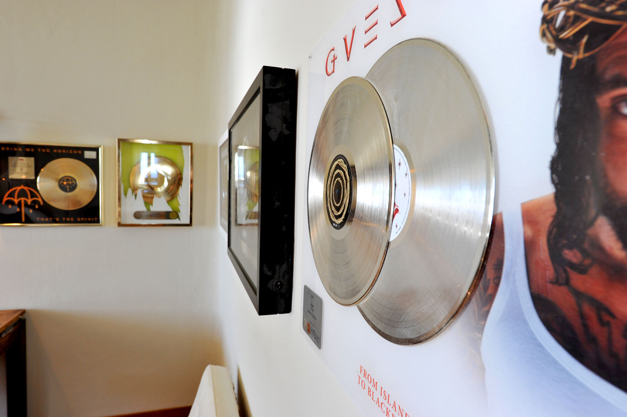 Gold and platinum records on the studio wall