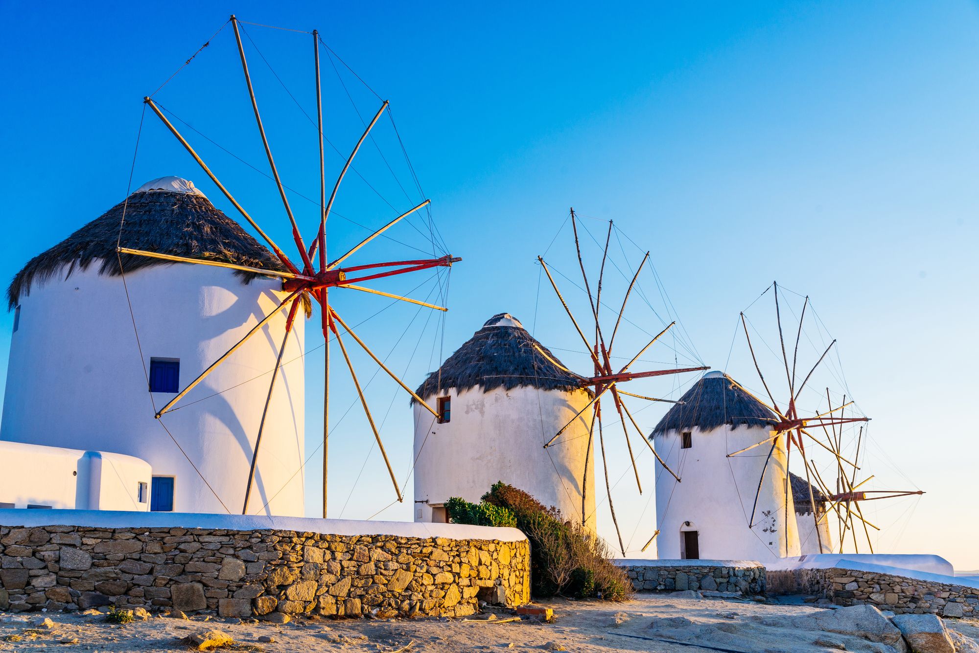 The white windmills of Kato Mili above Mykonos Town